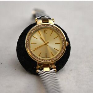 Charming Charlie Gold Tone Rhinestone Accent Black/White ZigZag Band Watch